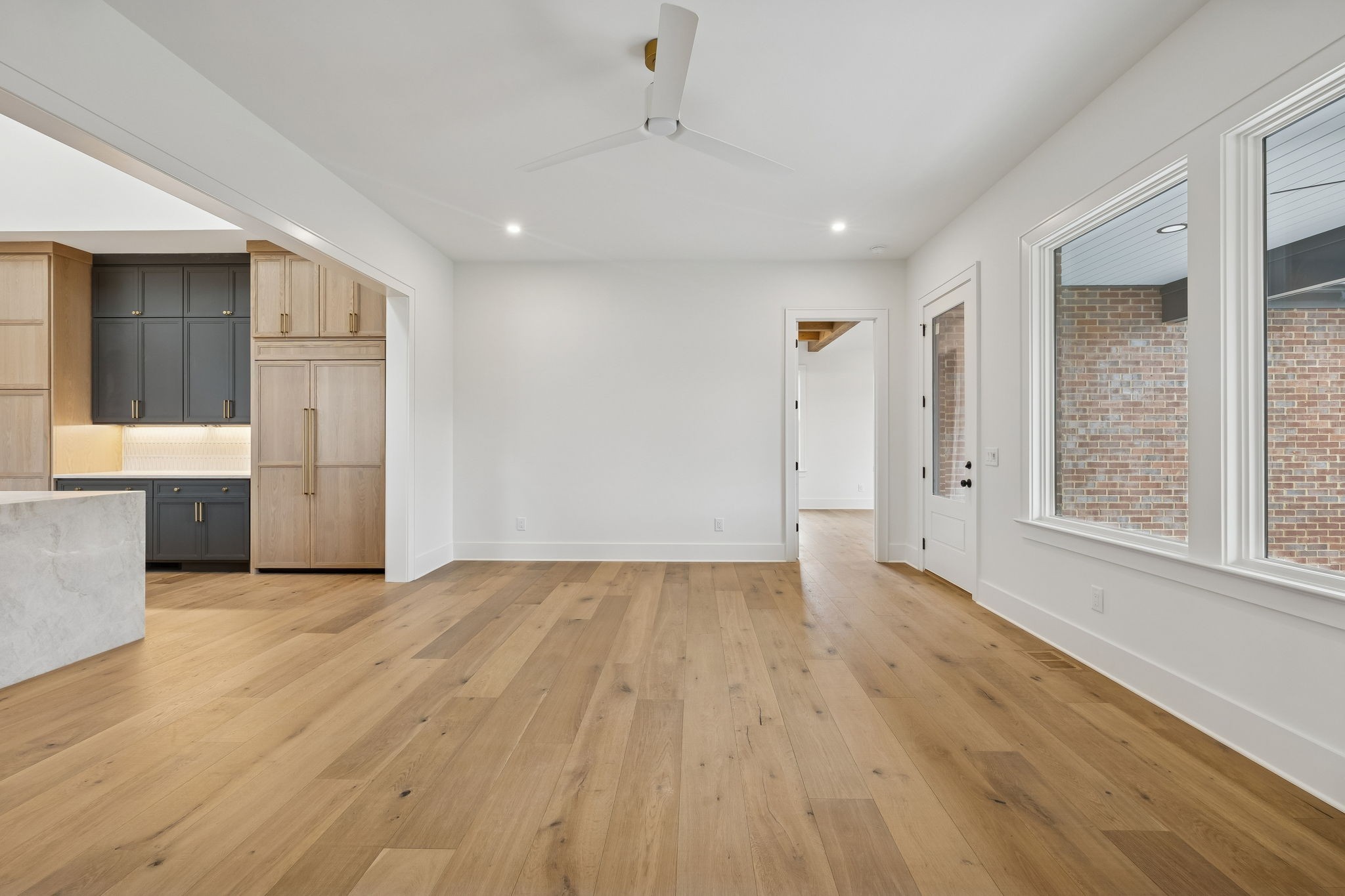 1130 Winding Way Road Nashville, TN 37216 - Photo 46 of 96 an empty room with wooden floor and windows