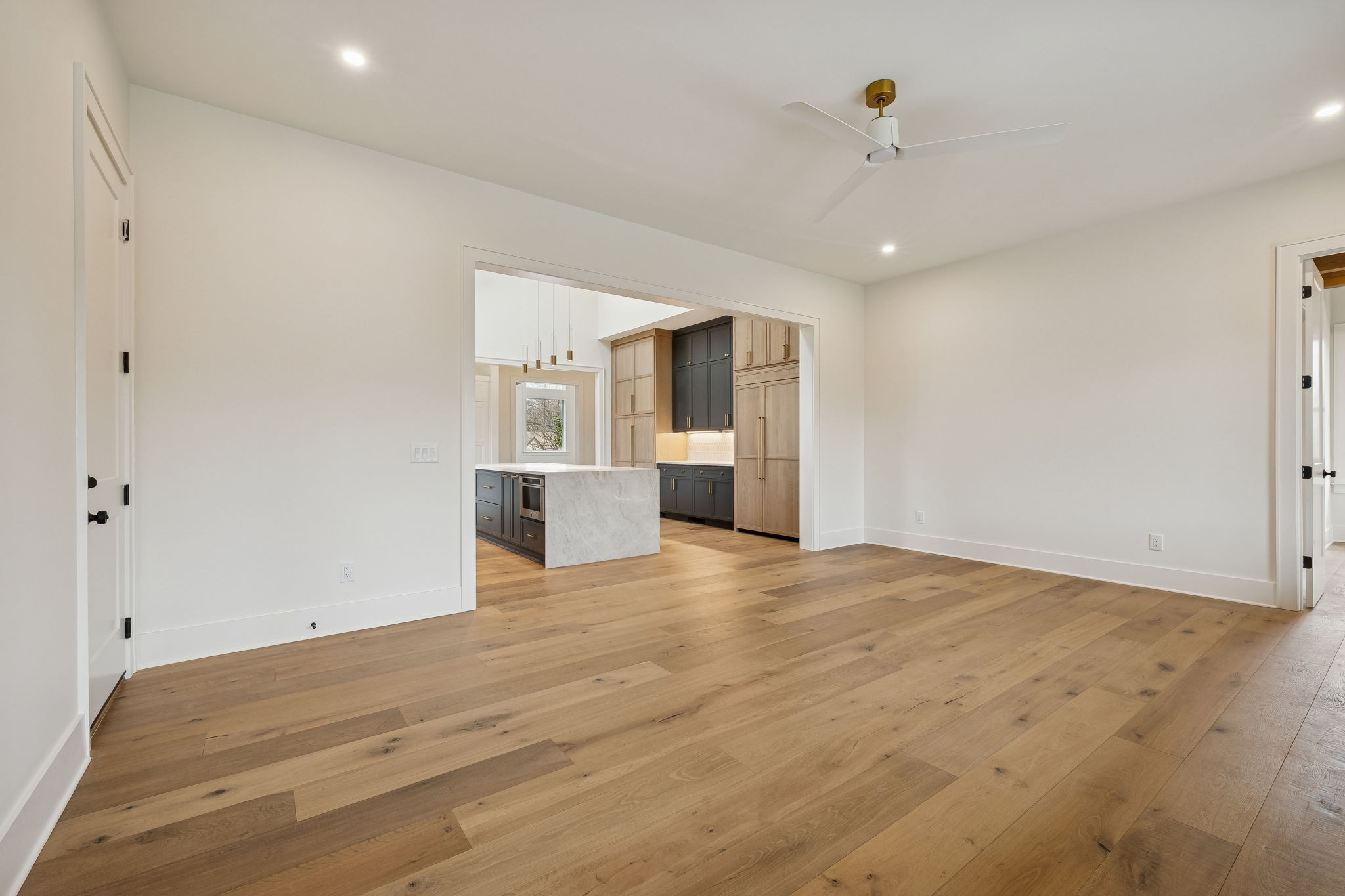1130 Winding Way Road Nashville, TN 37216 - Photo 47 of 96 a view of empty room with wooden floor and window