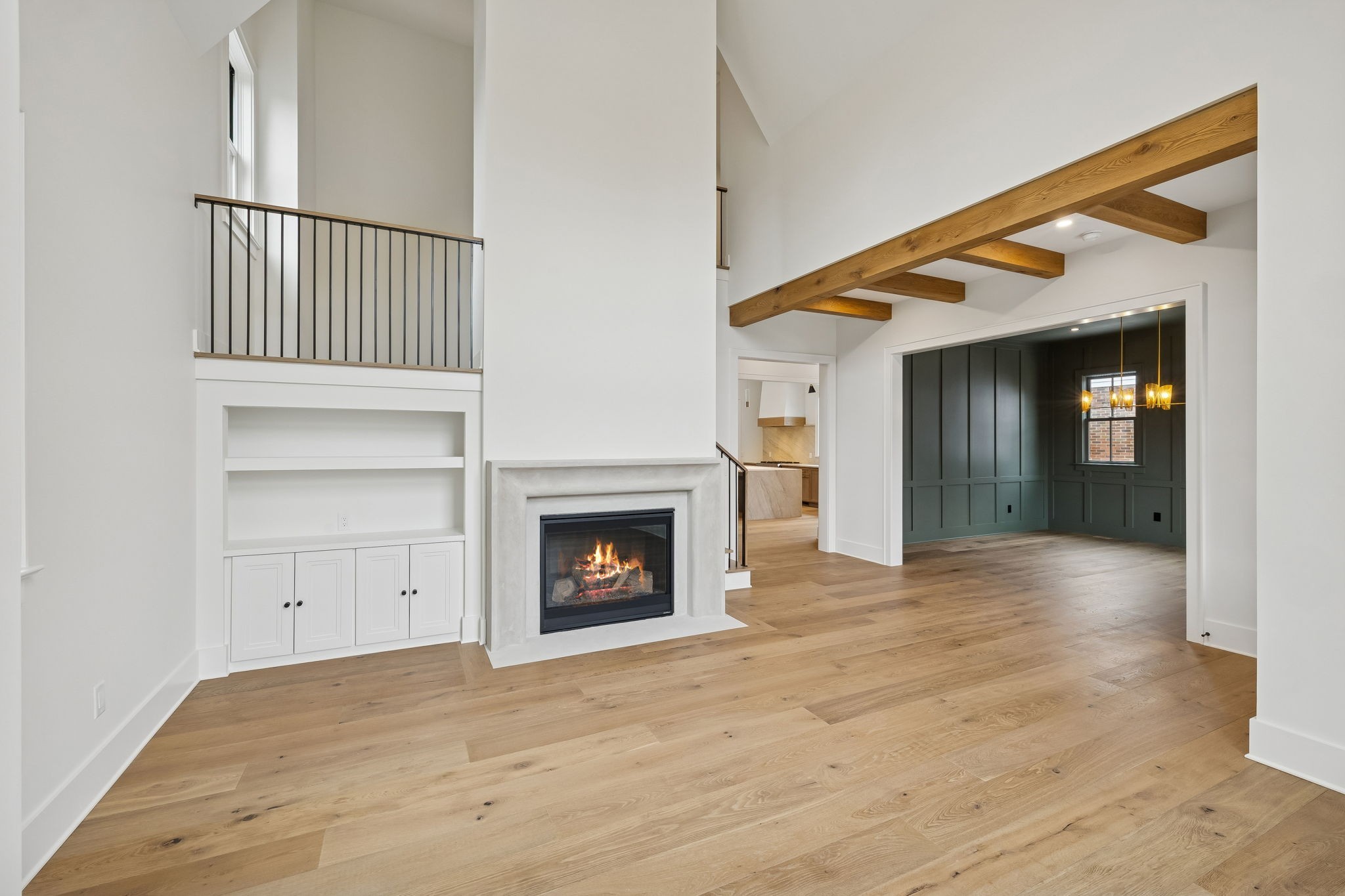 1130 Winding Way Road Nashville, TN 37216 - Photo 5 of 96 an empty room with a fireplace and wooden floor