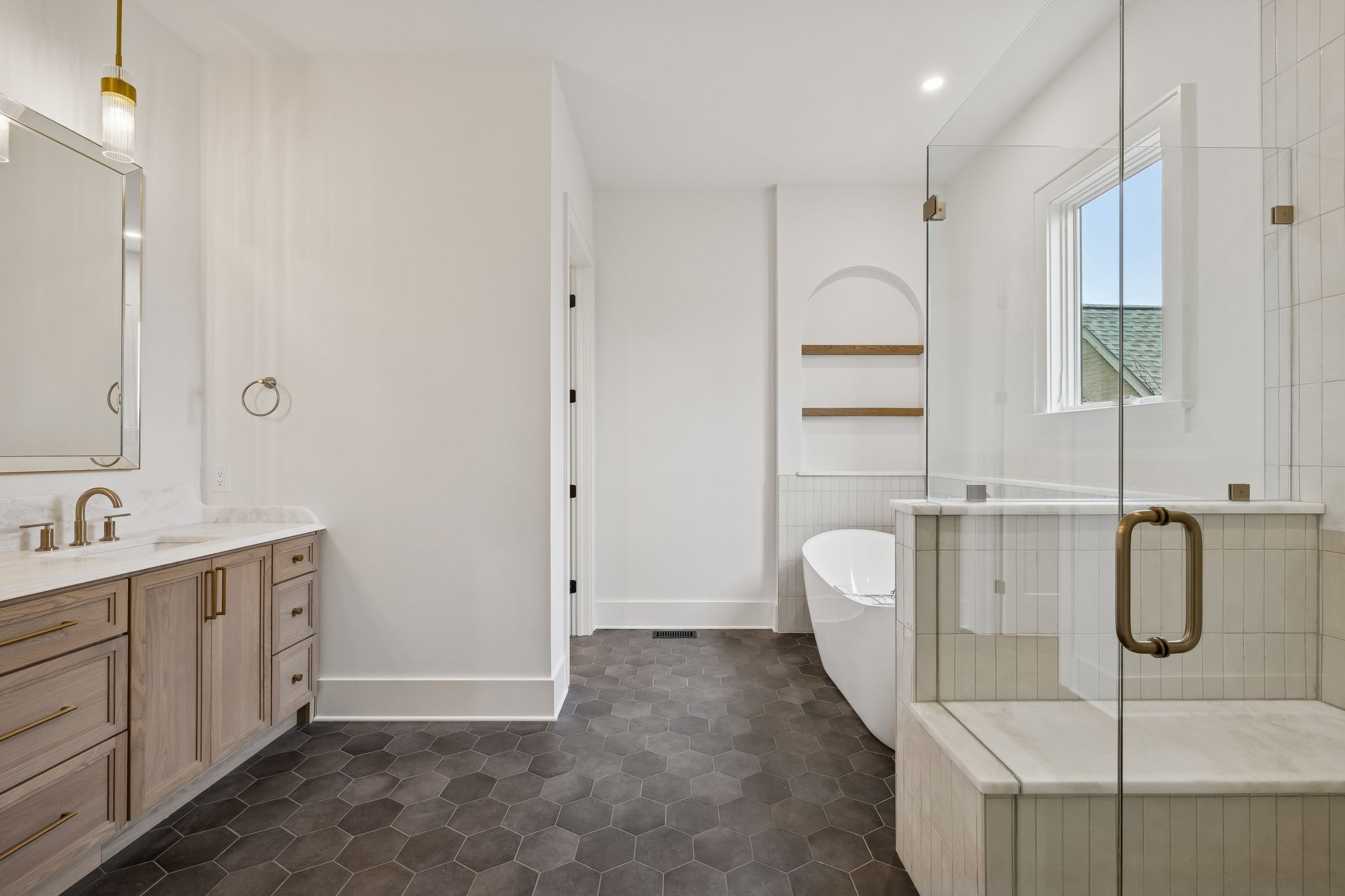 1130 Winding Way Road Nashville, TN 37216 - Photo 60 of 96 a bathroom with a tub sink and mirror