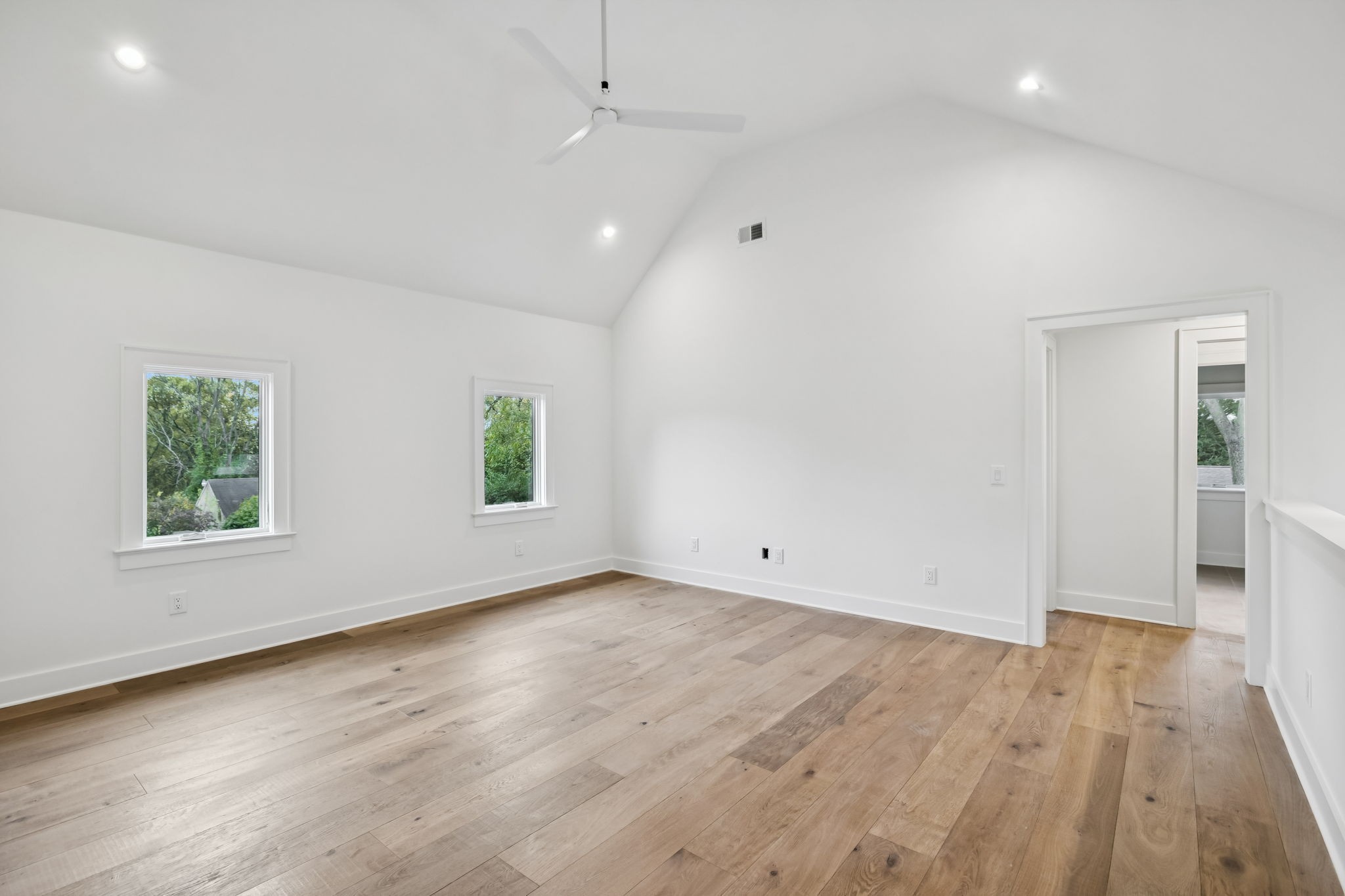 1130 Winding Way Road Nashville, TN 37216 - Photo 77 of 96 an empty room with wooden floor and windows