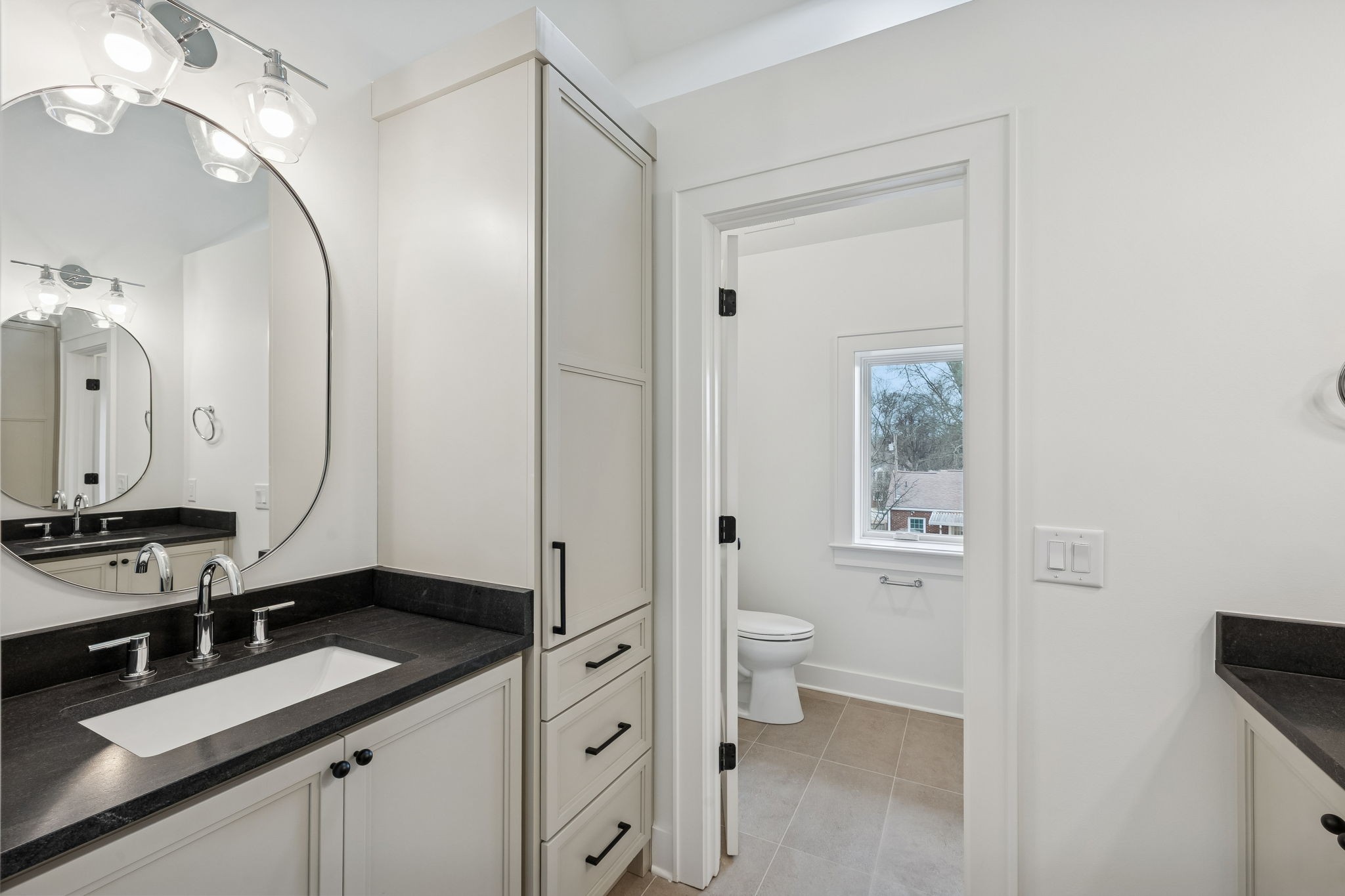 1130 Winding Way Road Nashville, TN 37216 - Photo 78 of 96 a bathroom with a sink a toilet and a mirror