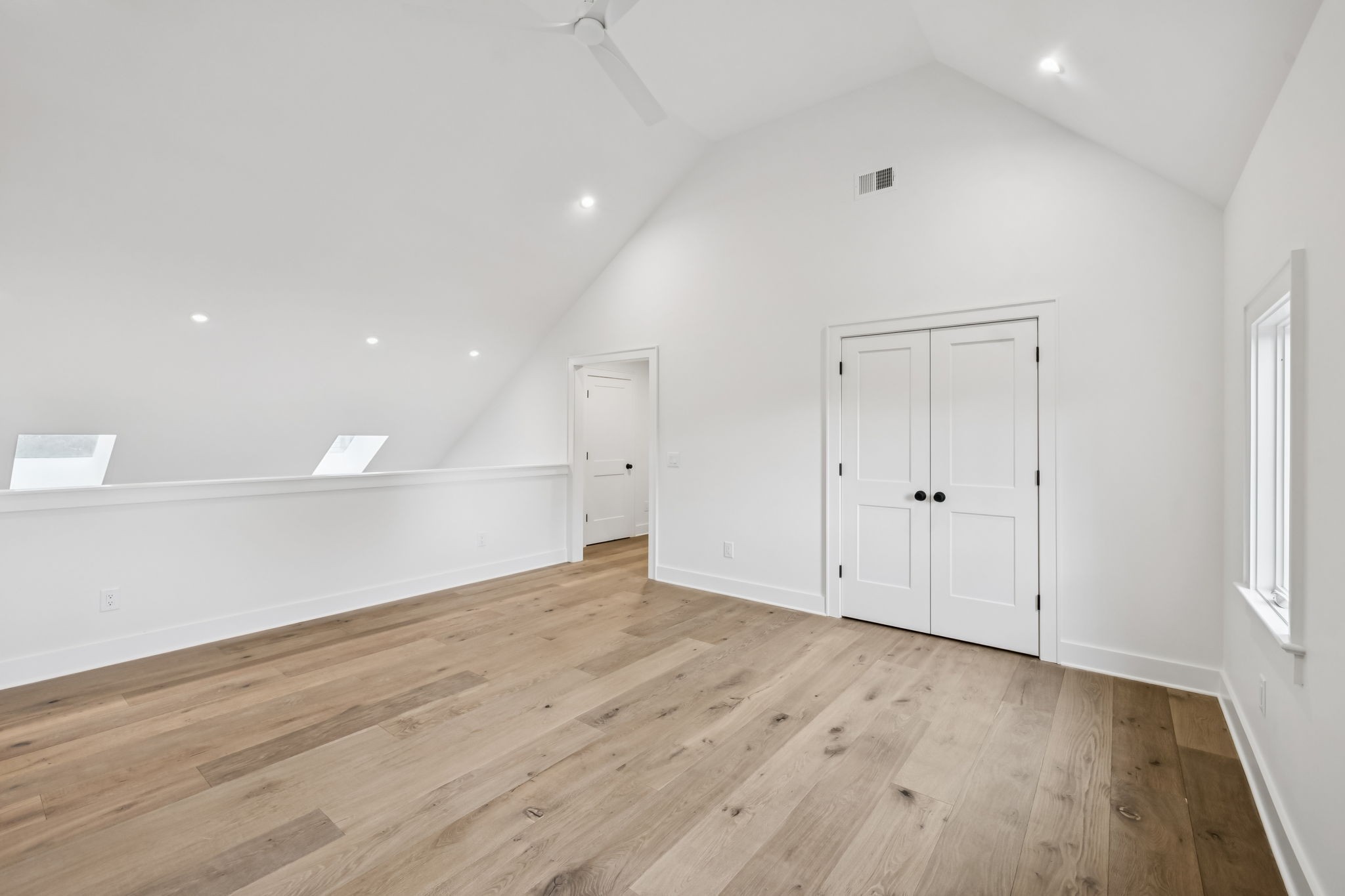 1130 Winding Way Road Nashville, TN 37216 - Photo 83 of 96 an empty room with wooden floor and windows