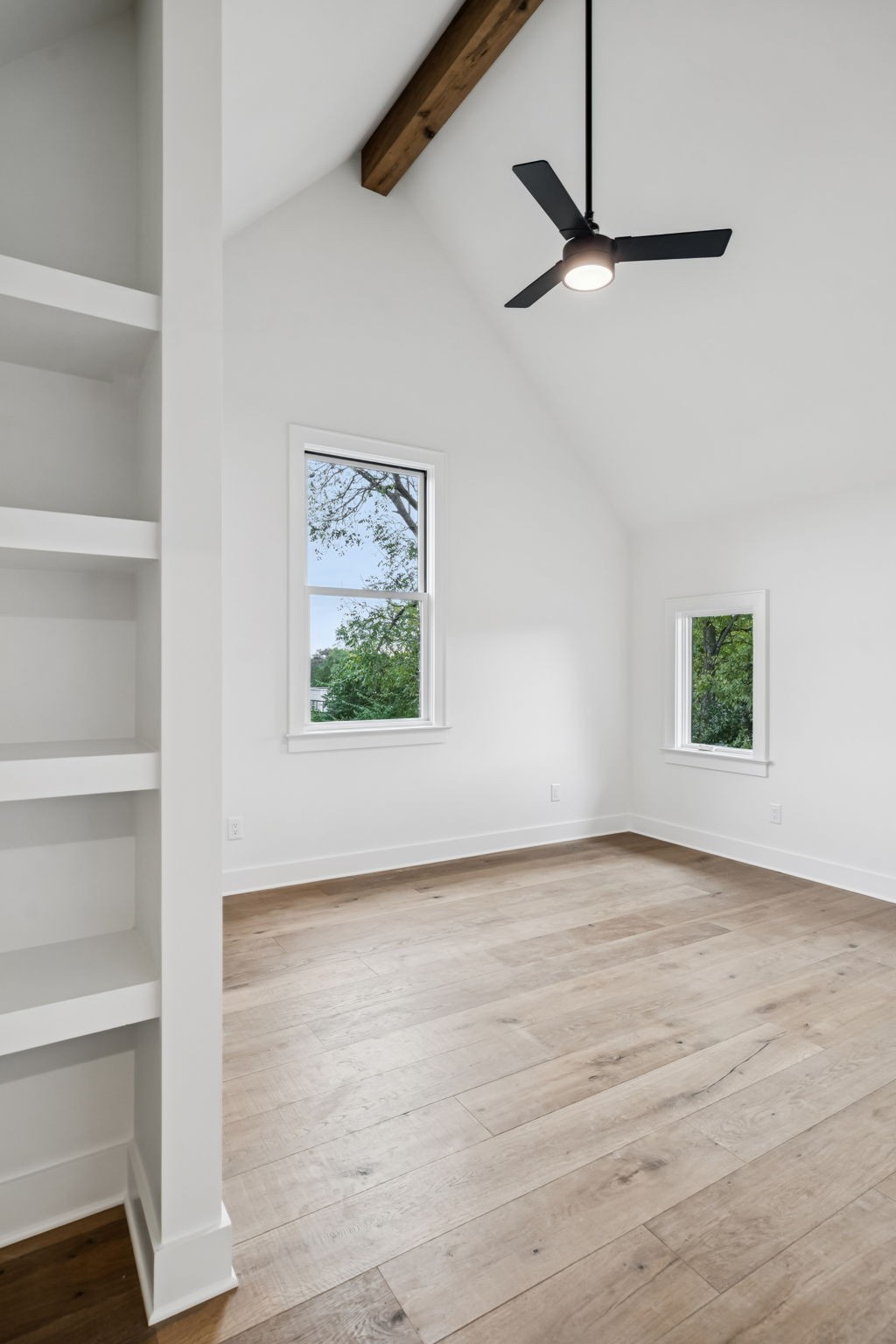 1130 Winding Way Road Nashville, TN 37216 - Photo 85 of 96 a view of an empty room with a window and wooden floor
