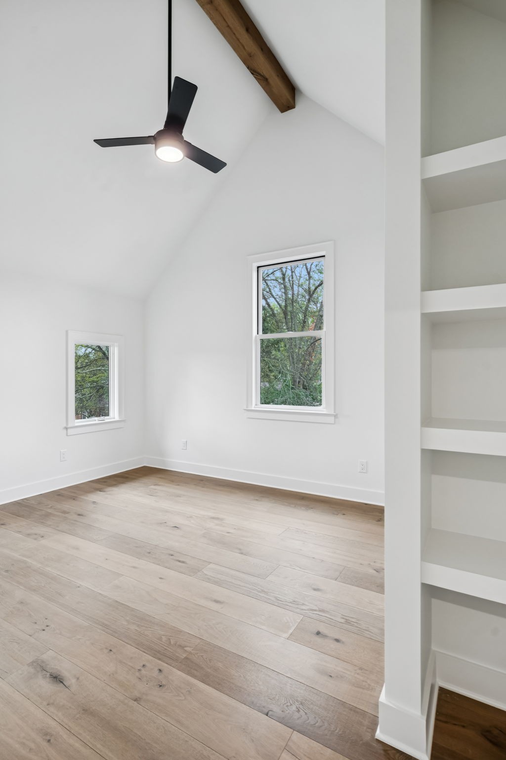 1130 Winding Way Road Nashville, TN 37216 - Photo 87 of 96 an empty room with wooden floor cabinet and windows