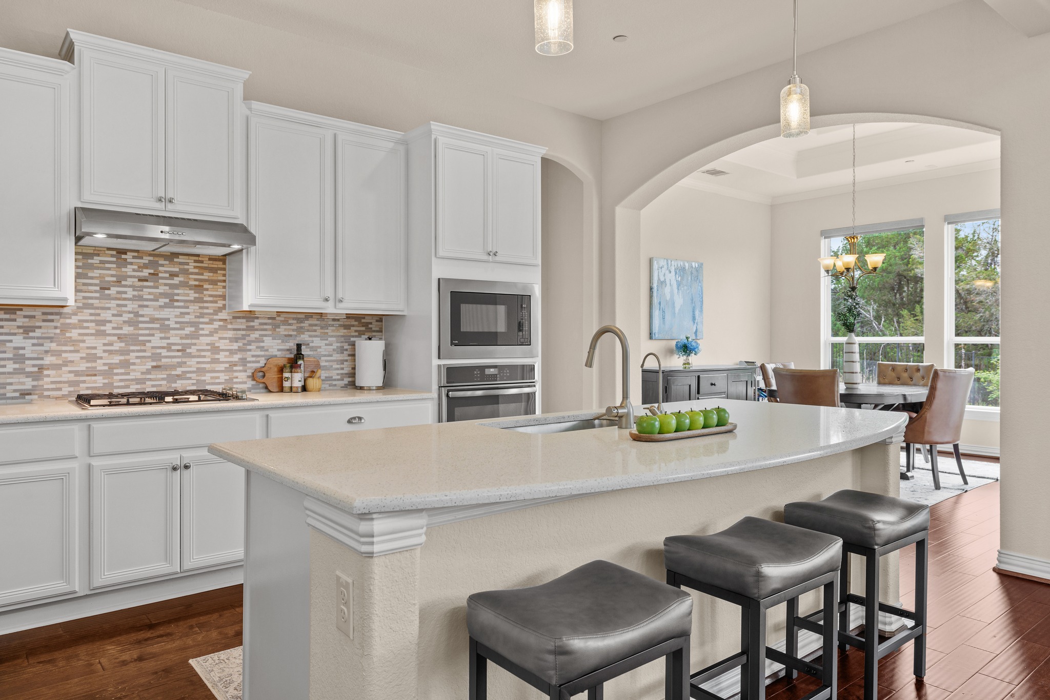 3914 Logan Ridge Drive Cedar Park, TX 78613 - Photo 14 of 40 a kitchen with appliances a sink and cabinets