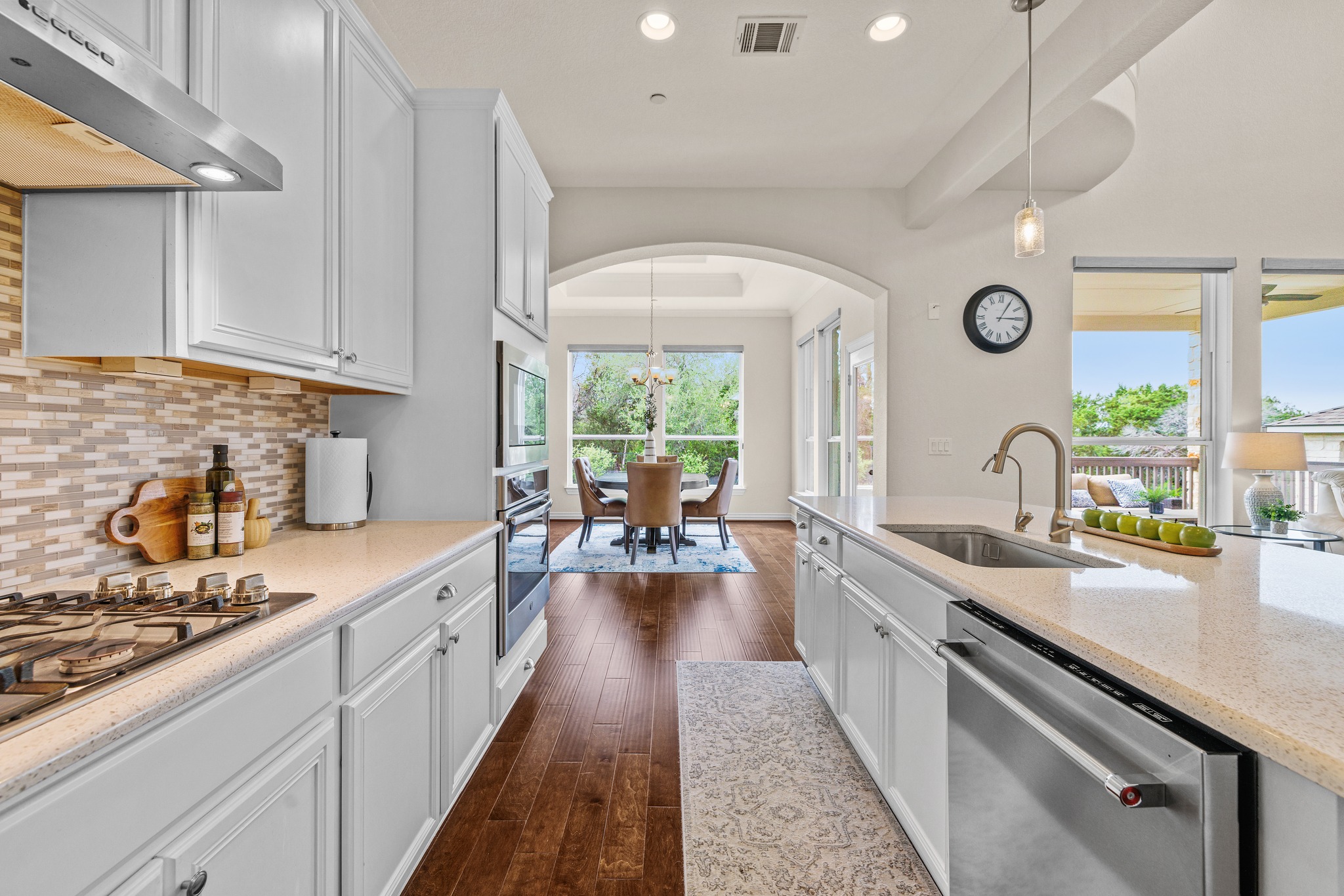 3914 Logan Ridge Drive Cedar Park, TX 78613 - Photo 15 of 40 a kitchen with sink stove and cabinets