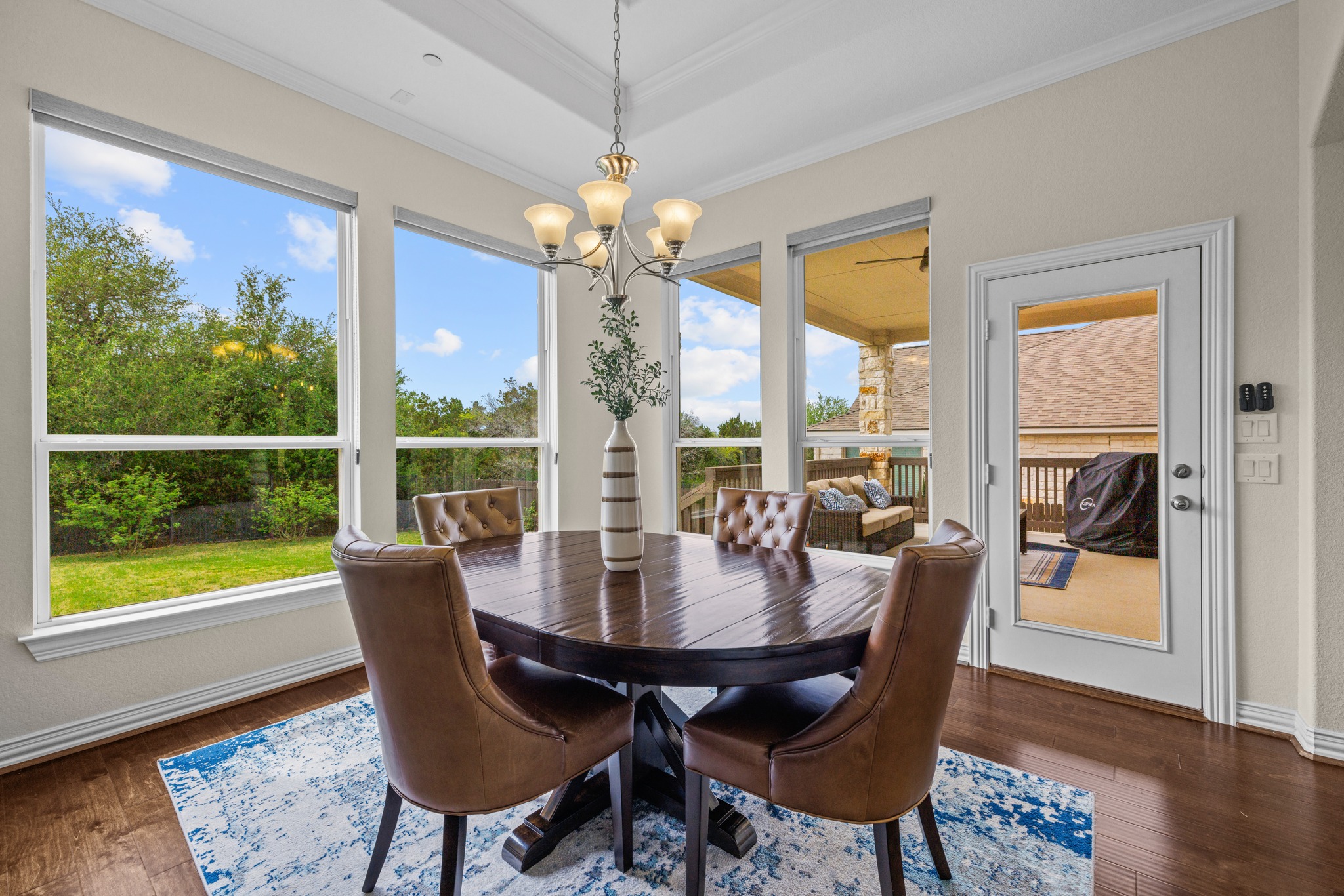 3914 Logan Ridge Drive Cedar Park, TX 78613 - Photo 18 of 40 a view of a dining room with furniture window and wooden floor