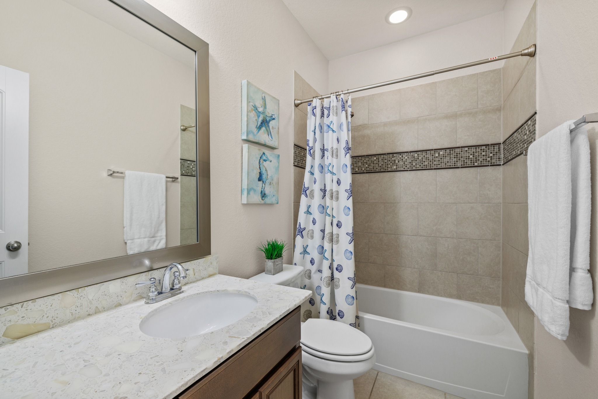 3914 Logan Ridge Drive Cedar Park, TX 78613 - Photo 28 of 40 a bathroom with a granite countertop sink toilet and shower