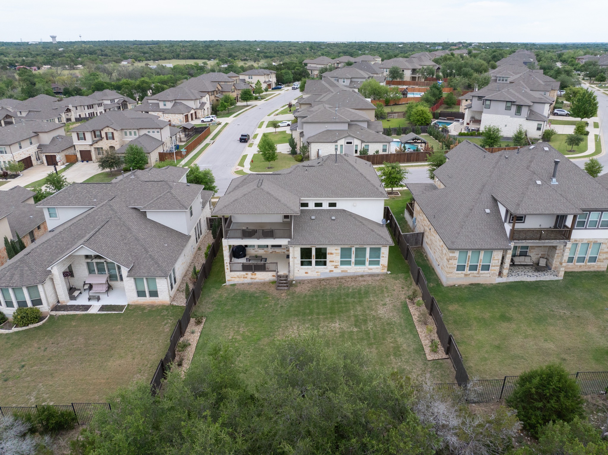 3914 Logan Ridge Drive Cedar Park, TX 78613 - Photo 38 of 40 an aerial view of a house with a garden