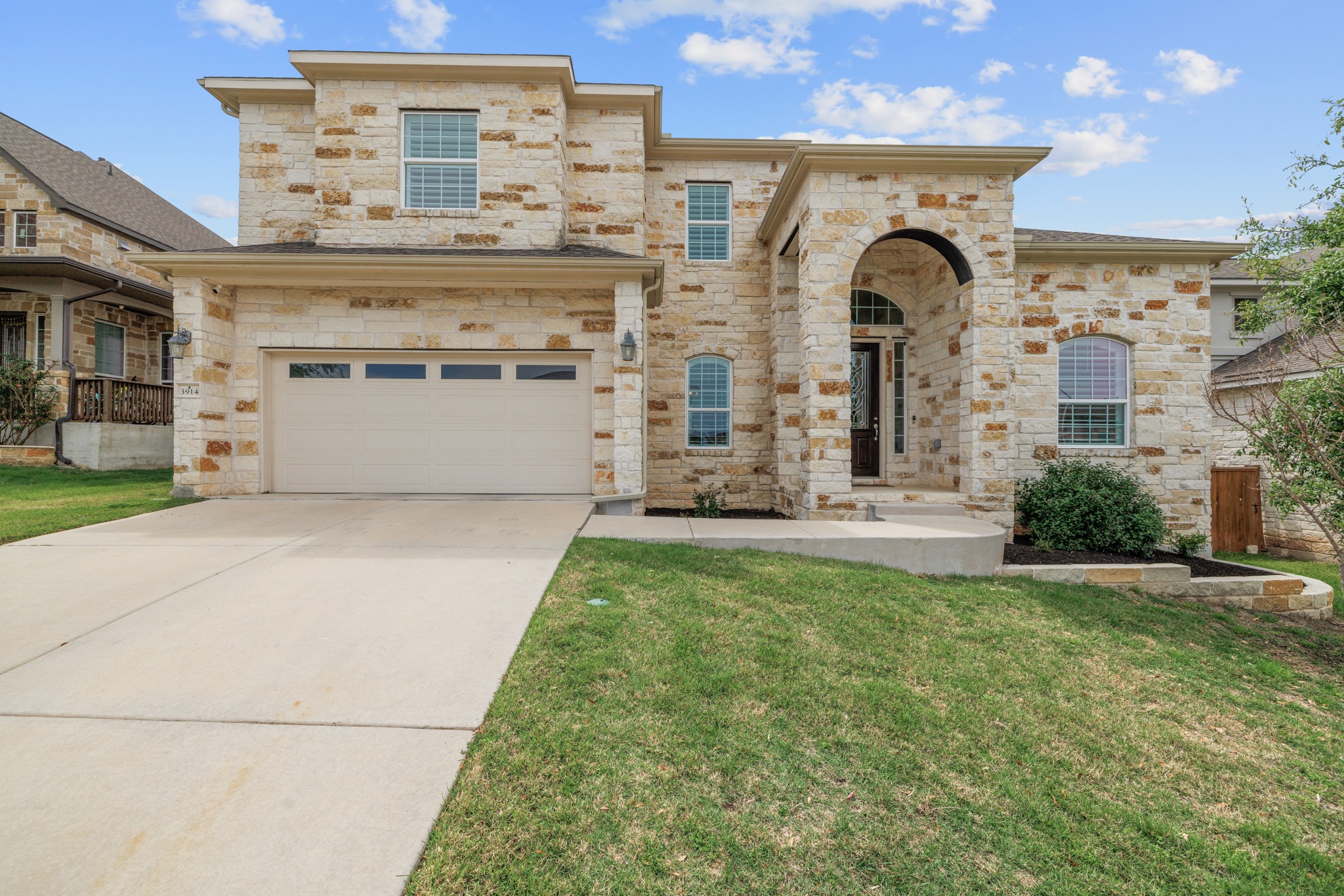 3914 Logan Ridge Drive Cedar Park, TX 78613 - Photo 4 of 40 a large building with a outdoor space