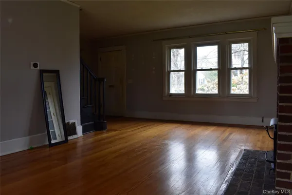a workspace with furniture and window