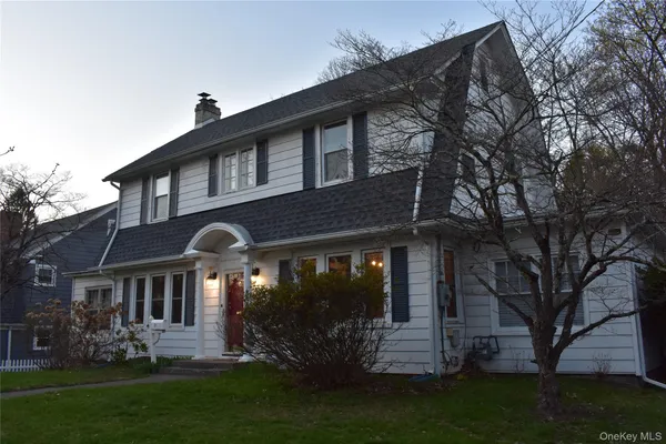 a house view with a garden space