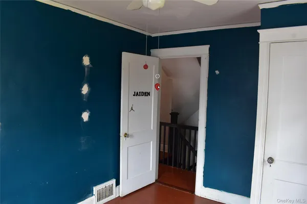 a view of an empty room and window