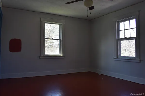 a view of appliances and window in a room