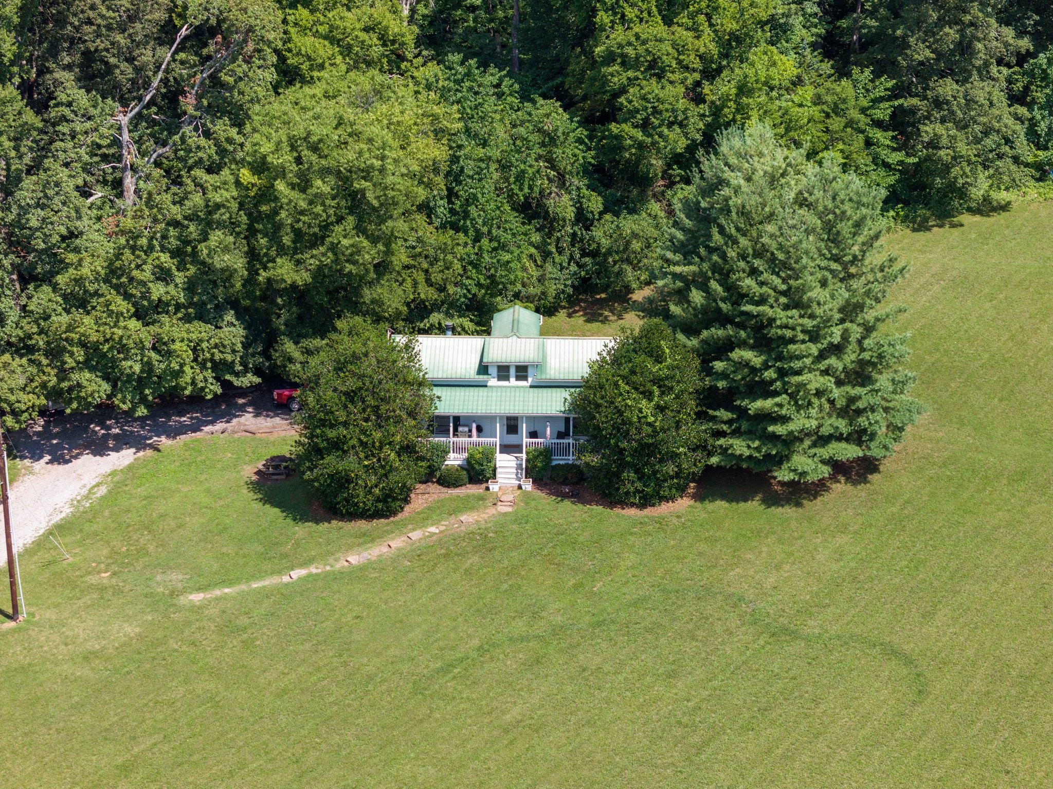 4092 Clovercroft Road Franklin, TN 37067 - Photo 12 of 26 a view of a house with a yard and potted plants