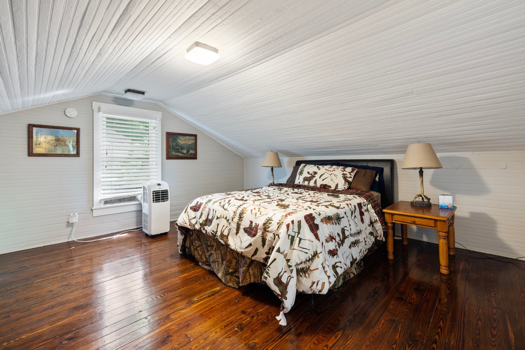 4092 Clovercroft Road Franklin, TN 37067 - Photo 20 of 26 a bedroom with a bed and wooden floor