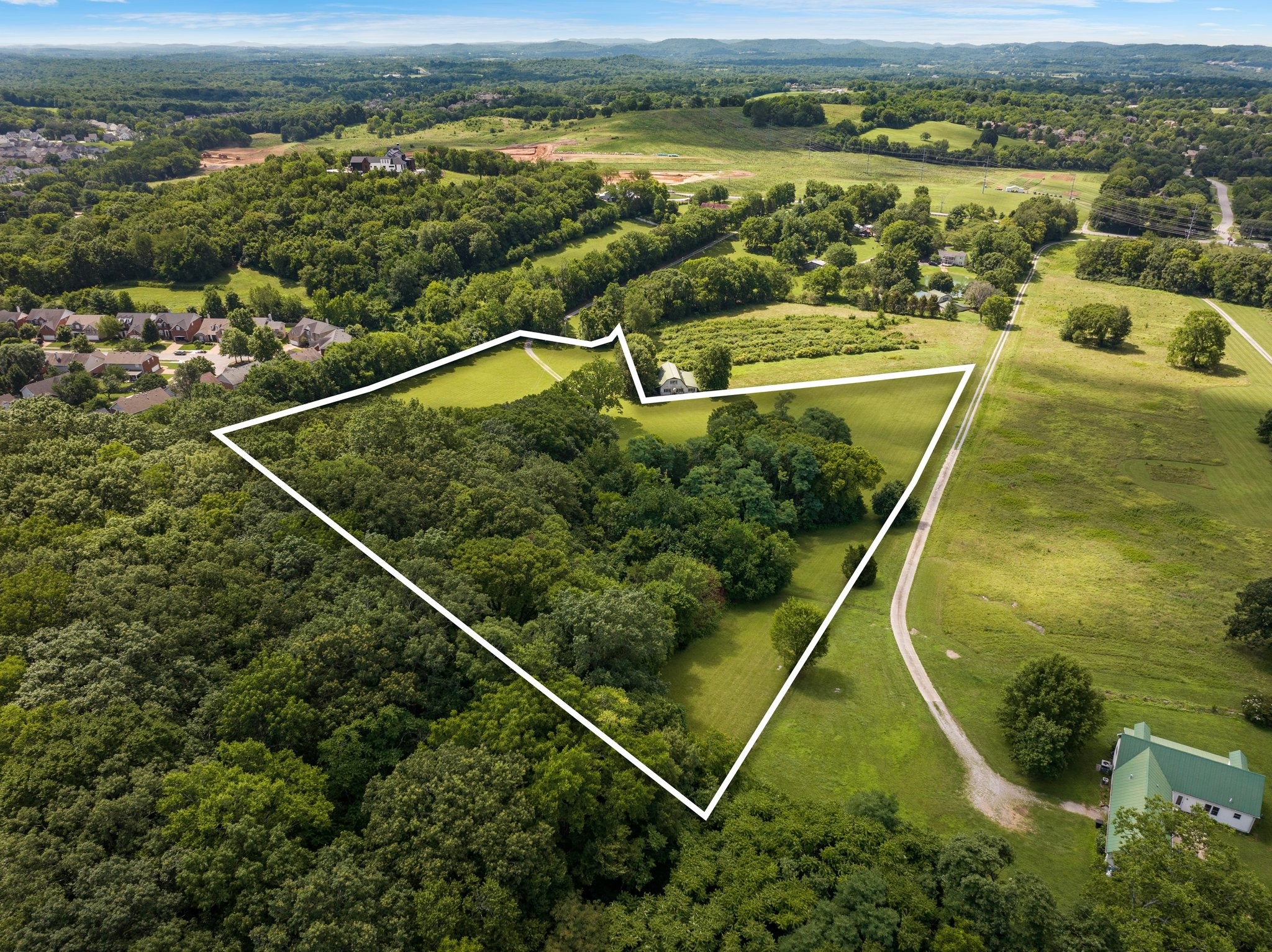 4092 Clovercroft Road Franklin, TN 37067 - Photo 3 of 26 a view of a tennis court