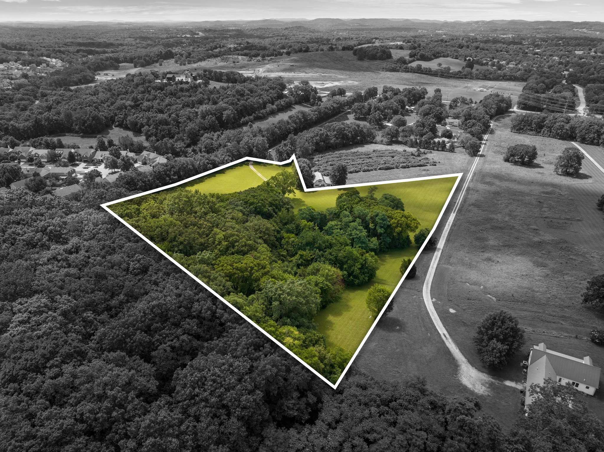 4092 Clovercroft Road Franklin, TN 37067 - Photo 4 of 26 an aerial view of a house with a swimming pool