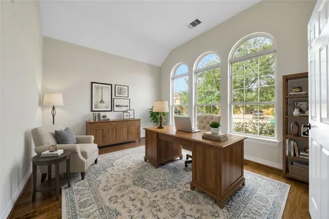 a view of a livingroom with furniture window and outside view