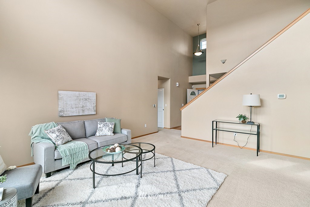 18210 Joseph Drive Southwest Rochester, WA 98579 - Photo 14 of 39 a living room with furniture and wooden floor