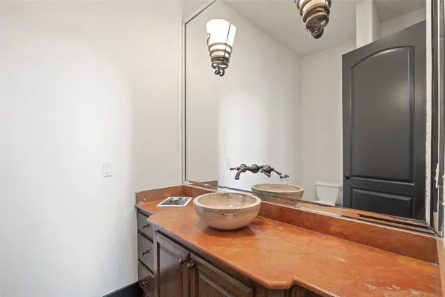 a bedroom with bed and a couch