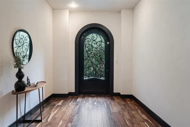 a view of entryway with wooden floor
