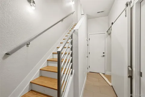 a close view of a utility room with dryer and washer