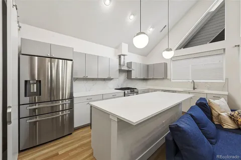 a view of a house with a parking space and a garage