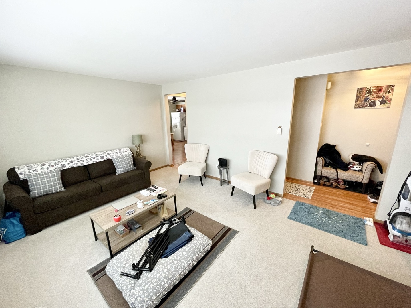 8804 45th Place, Unit 3 Brookfield, IL 60513 - Photo 2 of 9 a living room with furniture and a flat screen tv