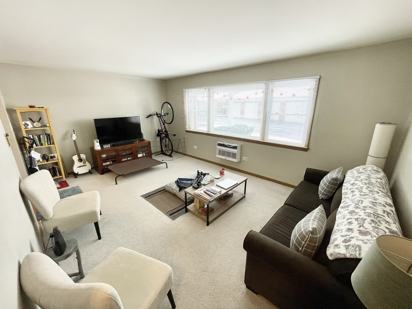 8804 45th Place, Unit 3 Brookfield, IL 60513 - Photo 3 of 9 a living room with furniture and a flat screen tv