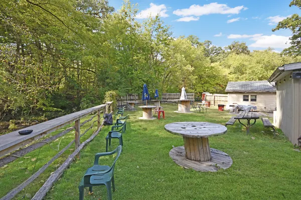 a view of a swimming pool with a patio