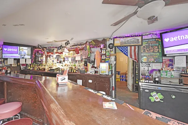 a room with furniture and a large window