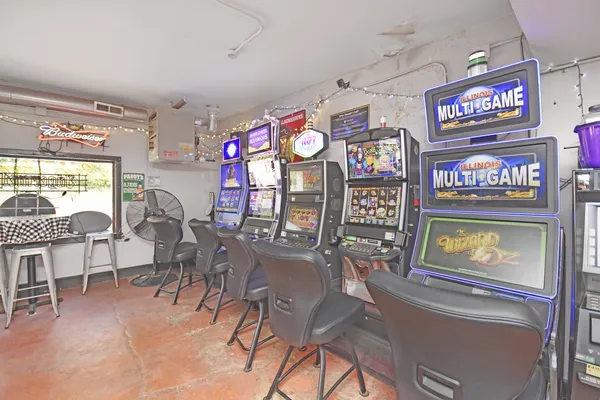 a view of a chairs and table in the outdoor space