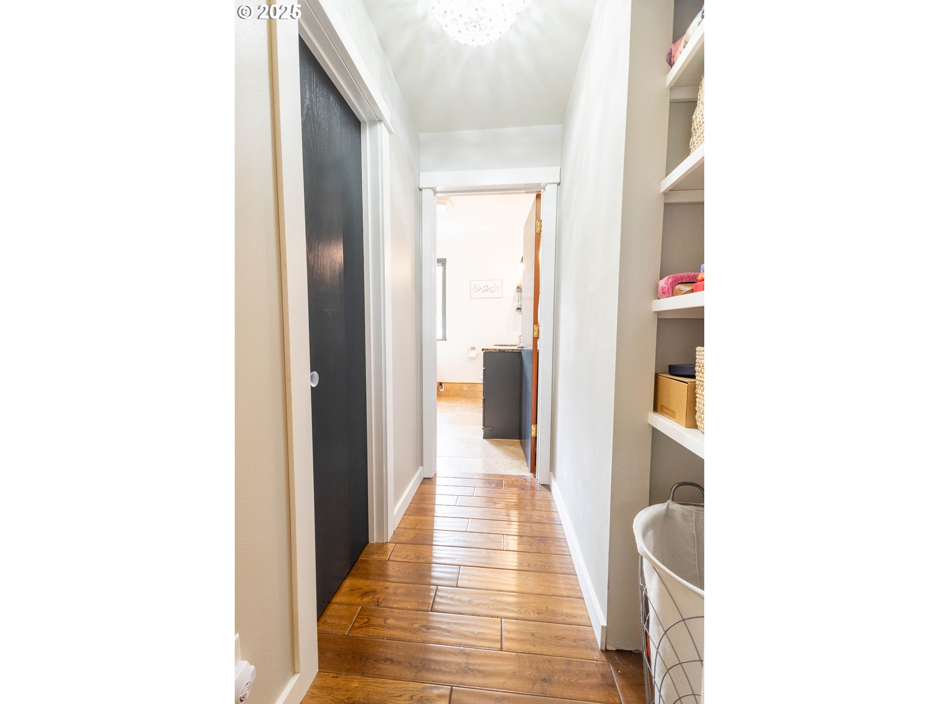 2000 Scorpio Drive La Grande, OR 97850 - Photo 13 of 36 a view of a hallway with wooden floor