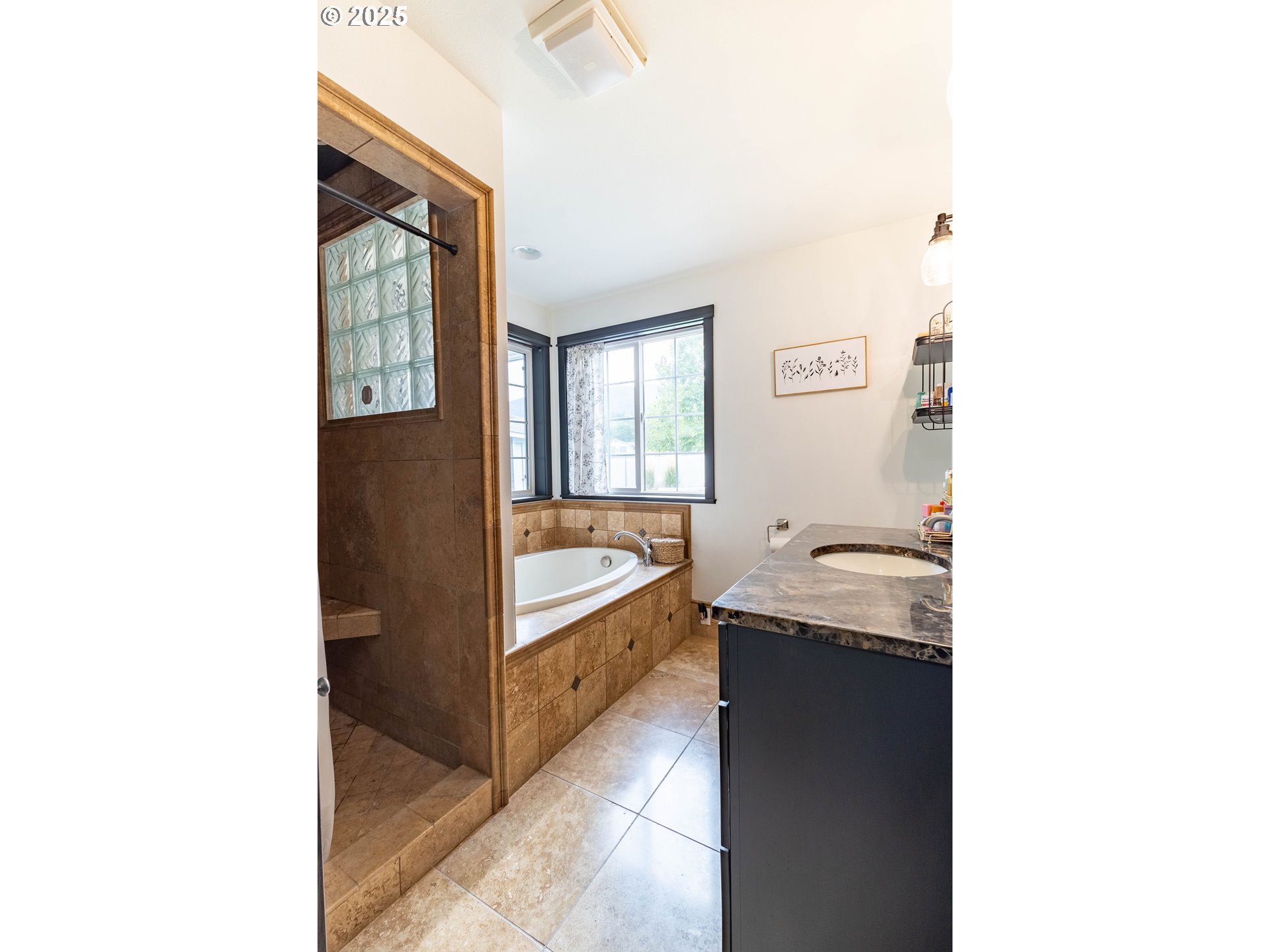 2000 Scorpio Drive La Grande, OR 97850 - Photo 14 of 36 a bathroom with a tub sink and mirror