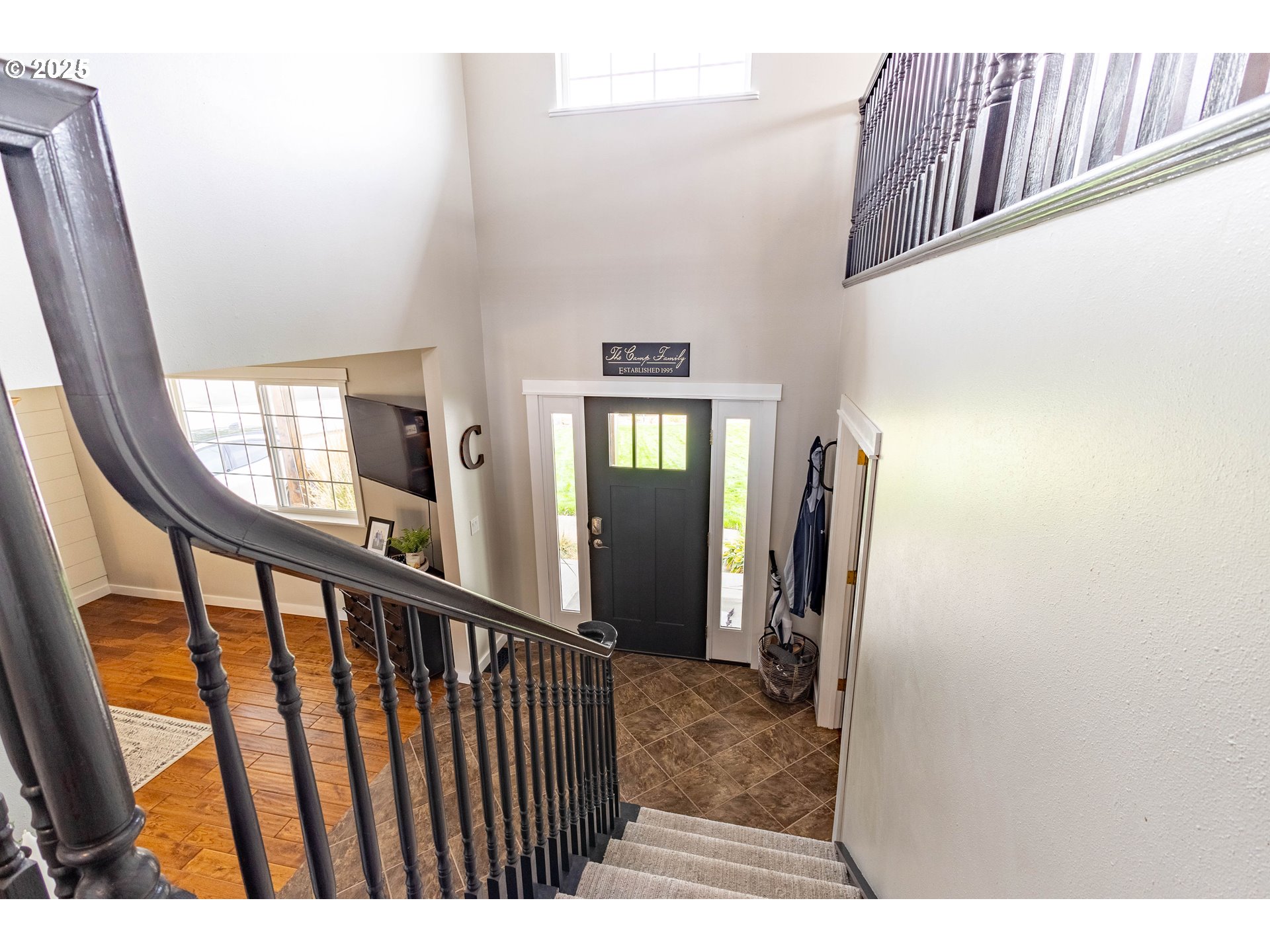 2000 Scorpio Drive La Grande, OR 97850 - Photo 16 of 36 a view of a hallway with wooden floor and stairs