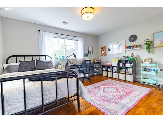 a very nice looking living room with a large window