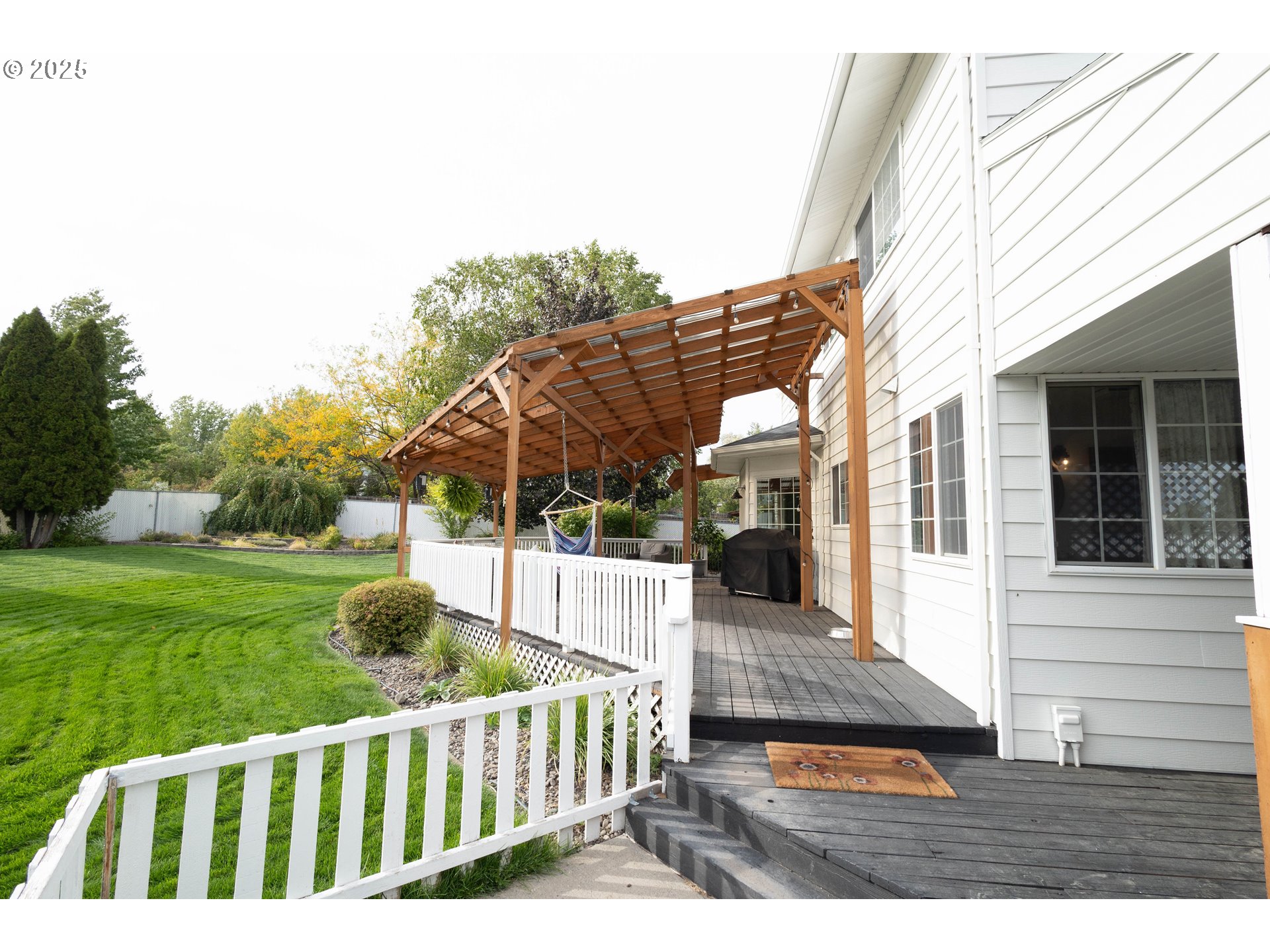 2000 Scorpio Drive La Grande, OR 97850 - Photo 33 of 36 a view of a house with backyard and porch