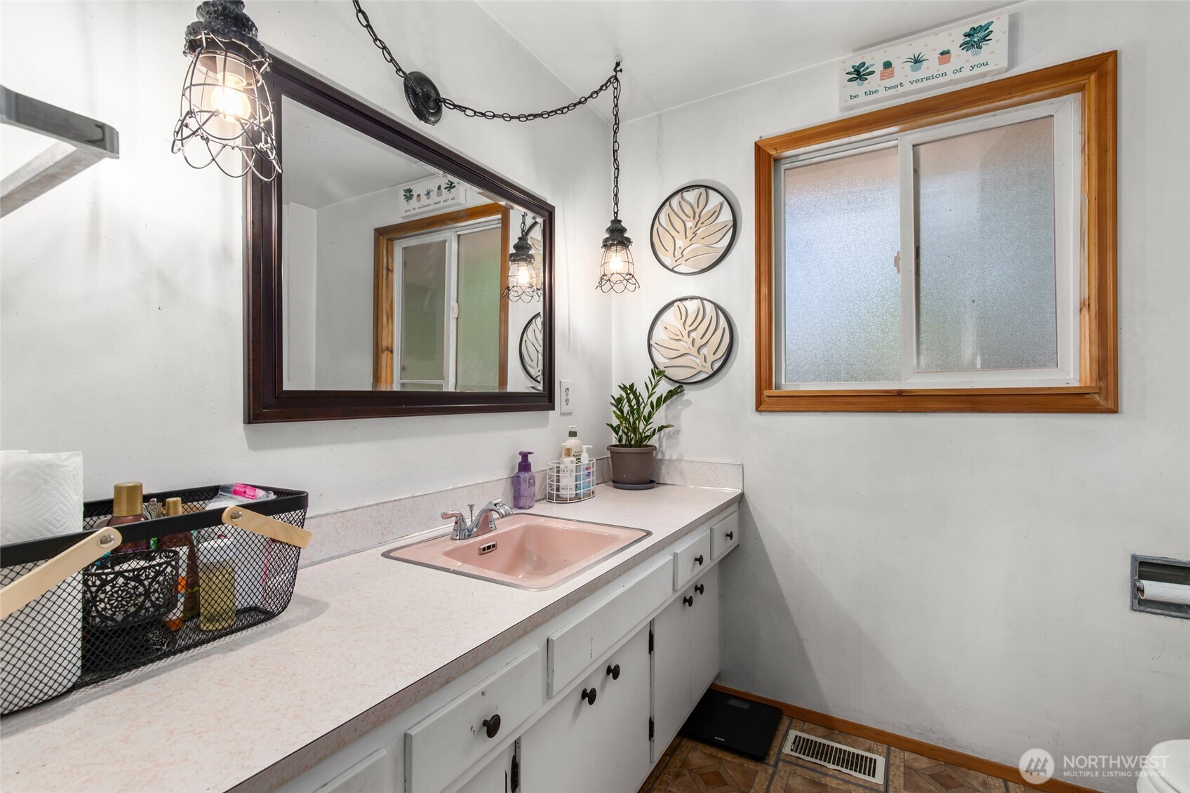 17543 7th Avenue Northeast Shoreline, WA 98155 - Photo 16 of 37 a bathroom with a sink and a mirror