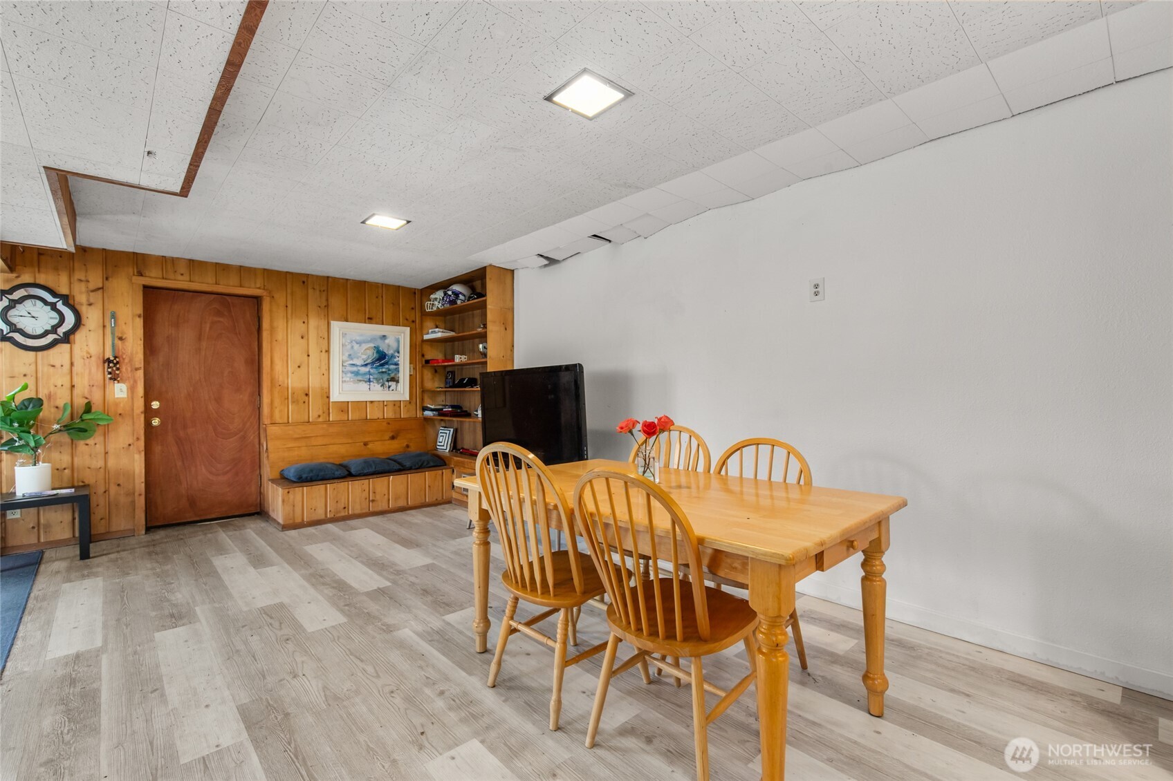 17543 7th Avenue Northeast Shoreline, WA 98155 - Photo 24 of 37 a dining room with furniture and wooden floor