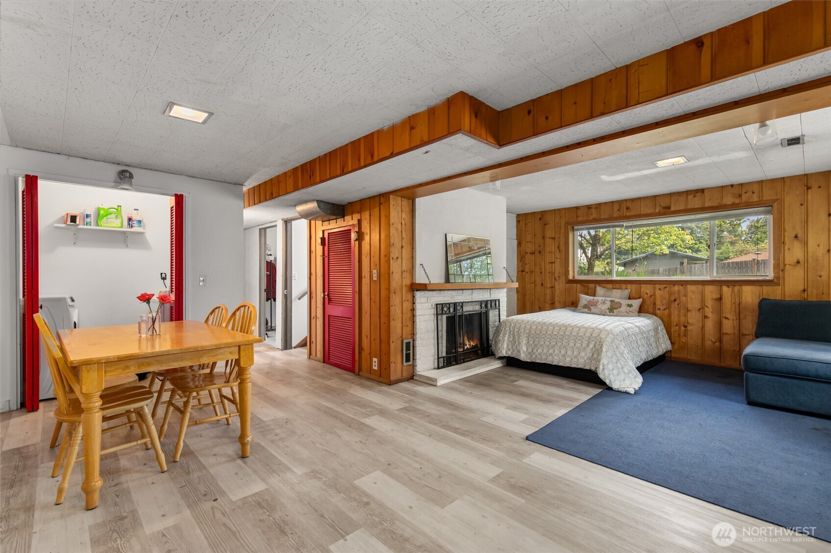 17543 7th Avenue Northeast Shoreline, WA 98155 - Photo 25 of 37 a bedroom with furniture and a large window