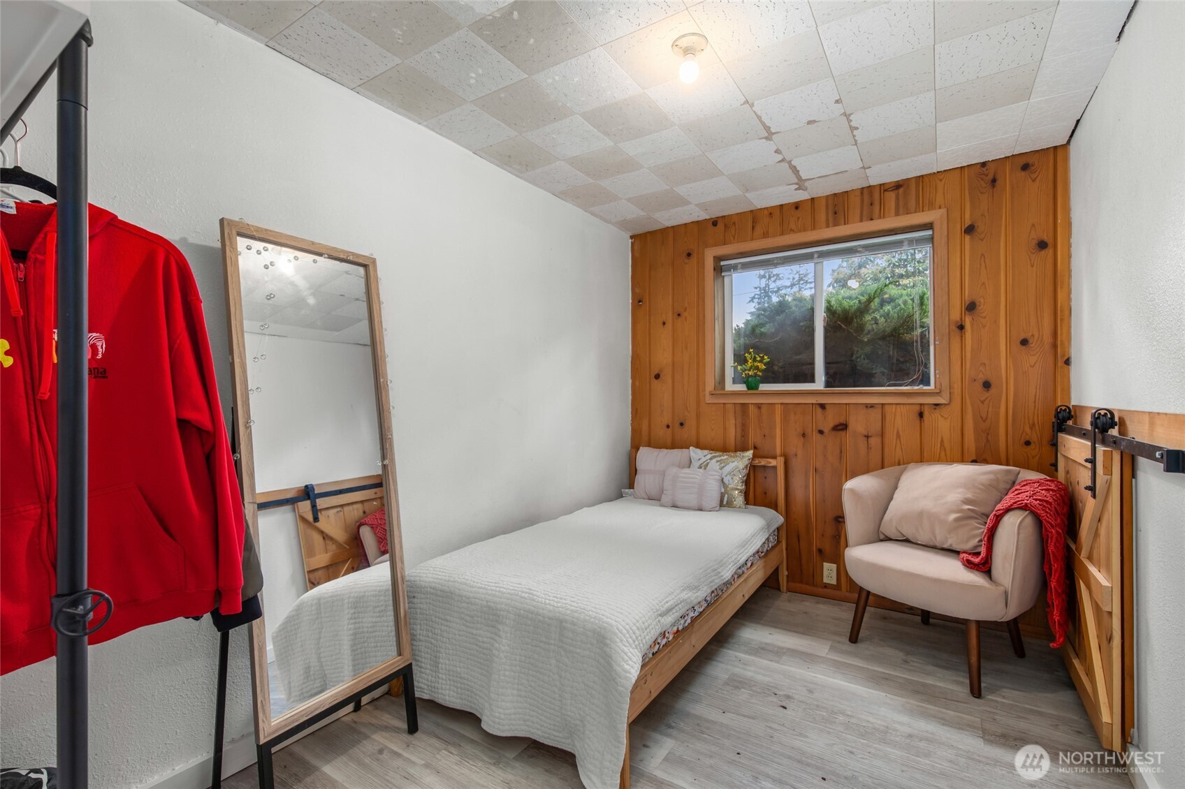 17543 7th Avenue Northeast Shoreline, WA 98155 - Photo 28 of 37 a bedroom with a bed and a couch