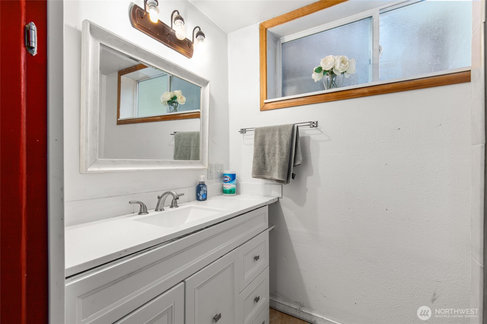 17543 7th Avenue Northeast Shoreline, WA 98155 - Photo 29 of 37 a bathroom with a sink and a mirror