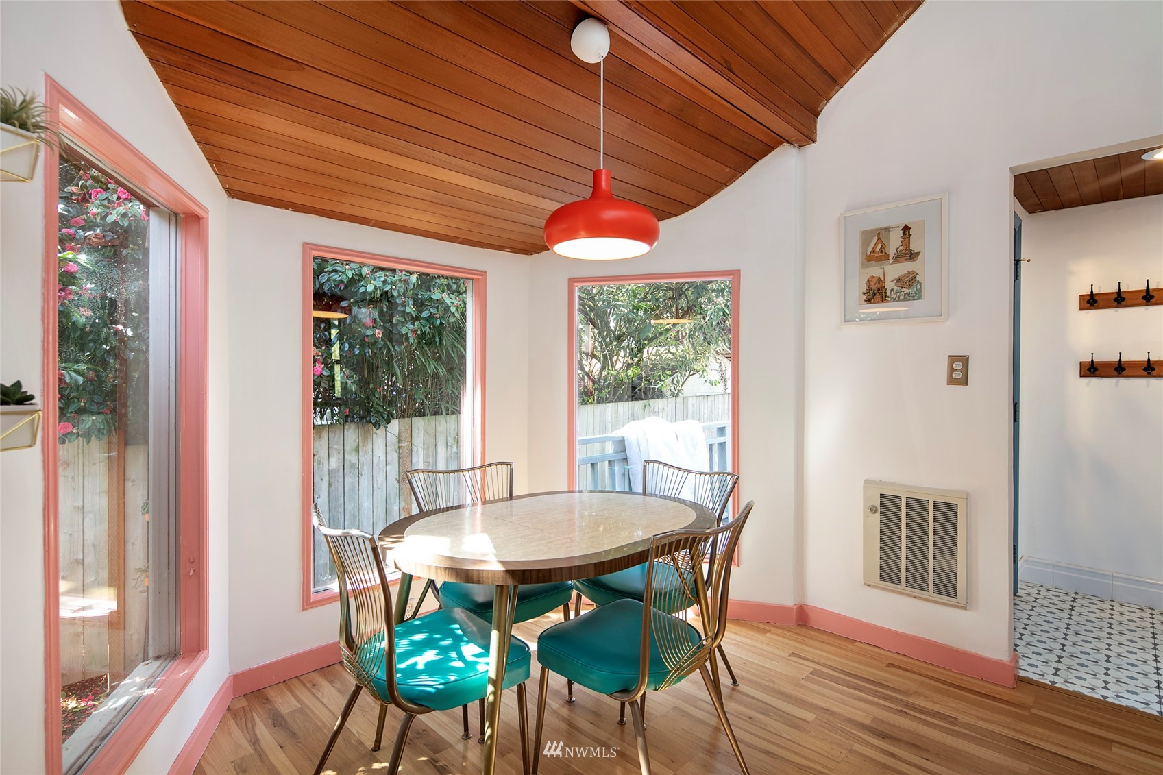 7141 47th Avenue Southwest Seattle, WA 98136 - Photo 11 of 27 a dining room with furniture and window
