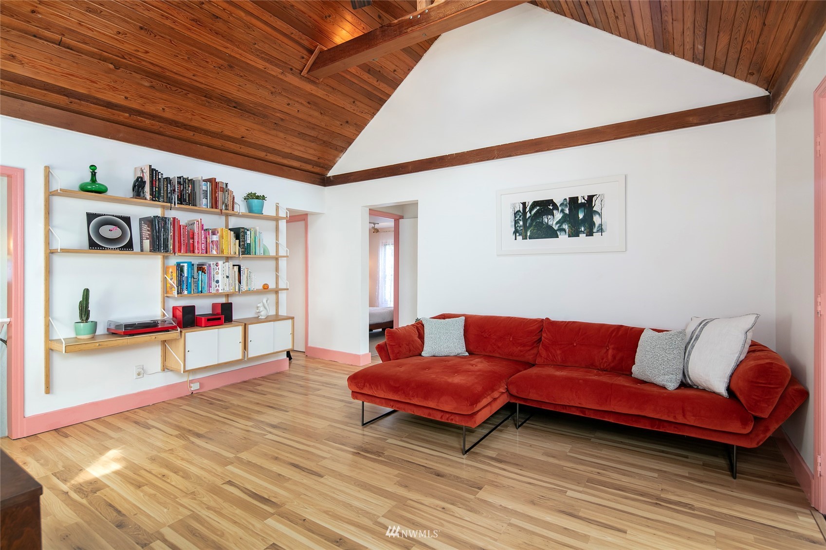 7141 47th Avenue Southwest Seattle, WA 98136 - Photo 12 of 27 a living room with furniture and a wooden floor