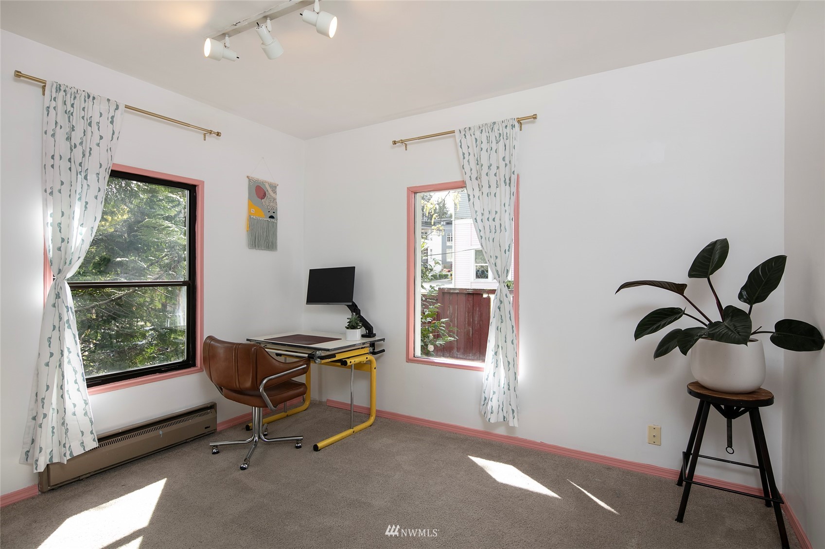 7141 47th Avenue Southwest Seattle, WA 98136 - Photo 18 of 27 a workspace with furniture and a window