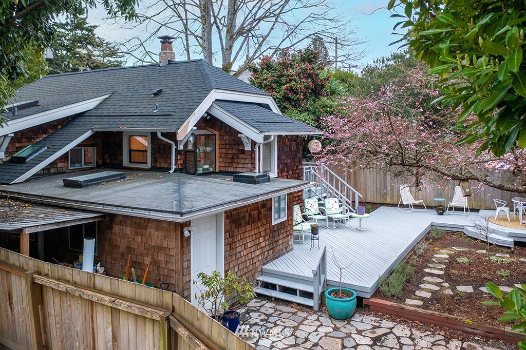 7141 47th Avenue Southwest Seattle, WA 98136 - Photo 24 of 27 a view of house with a outdoor space