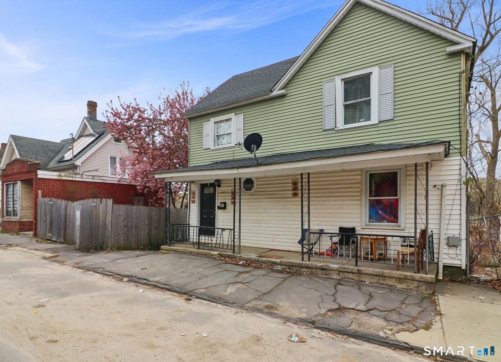 37 Manhan Street Waterbury, CT 06710 - Photo 6 of 19 a front view of a house with garage