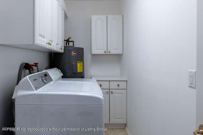 201 Pendleton Avenue Palm Beach, FL 33480 - Photo 15 of 22 a utility room with dryer and washer